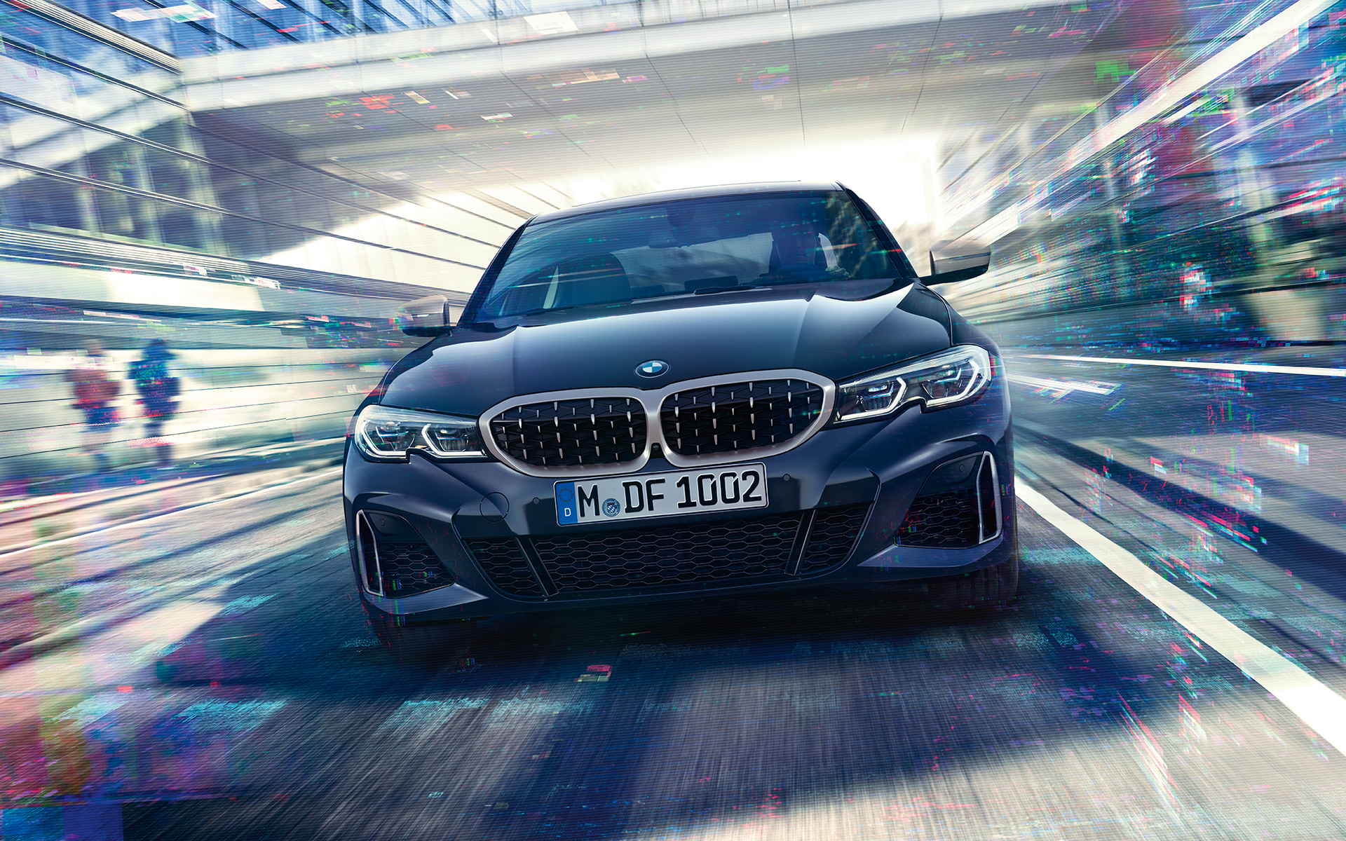 BMW M340i xDrive Sedán G20 2020 Black Sapphire metalizado Vista del frontal, en marcha