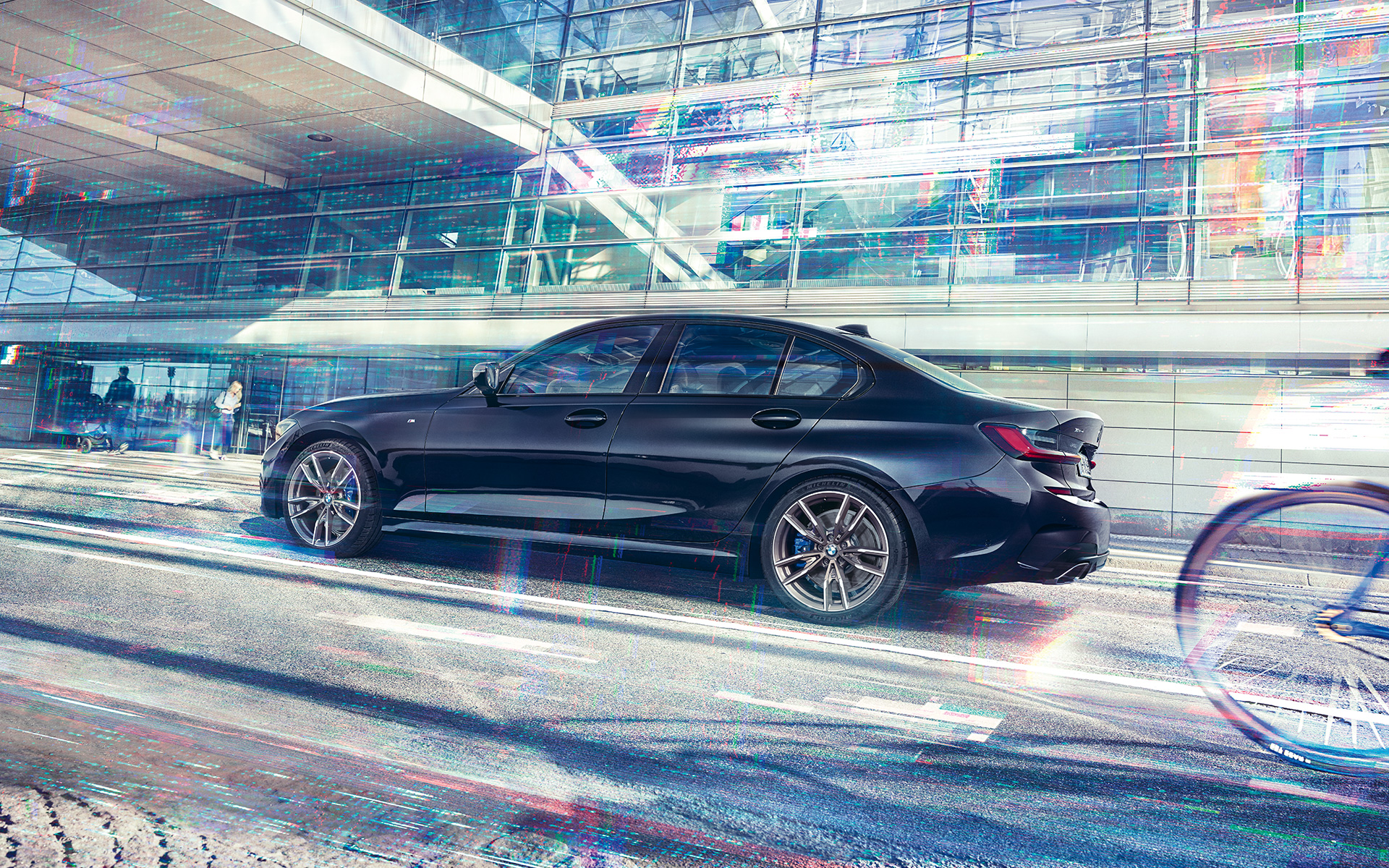 BMW M340i xDrive Sedán G20 2020 Black Sapphire metalizado Vista lateral, en marcha