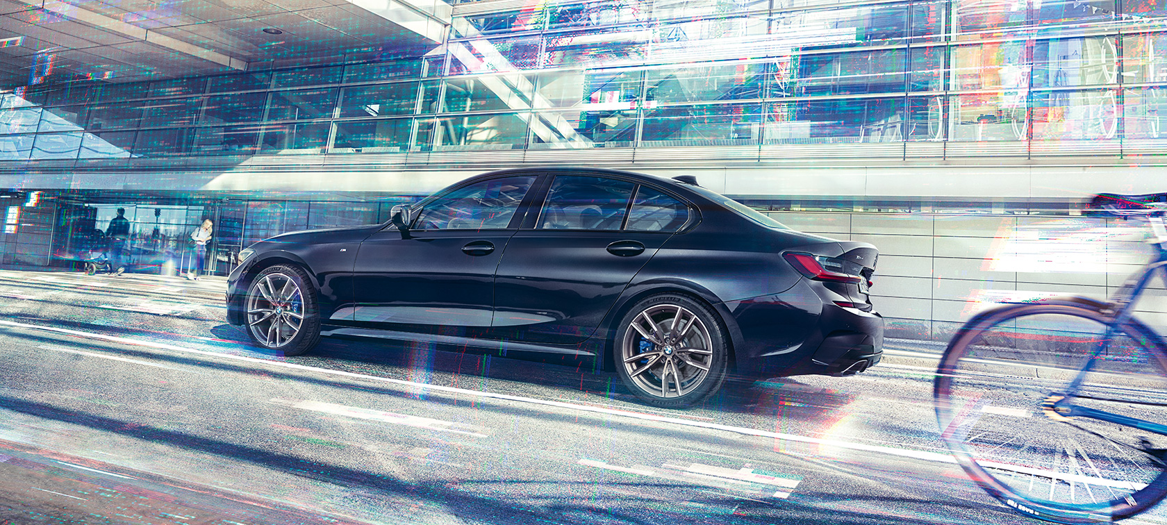 BMW M340i xDrive Sedán G20 2020 Vista lateral, en marcha BMW M340i xDrive Sedán G20 2020 Black Sapphire metalizado Vista lateral, en marcha