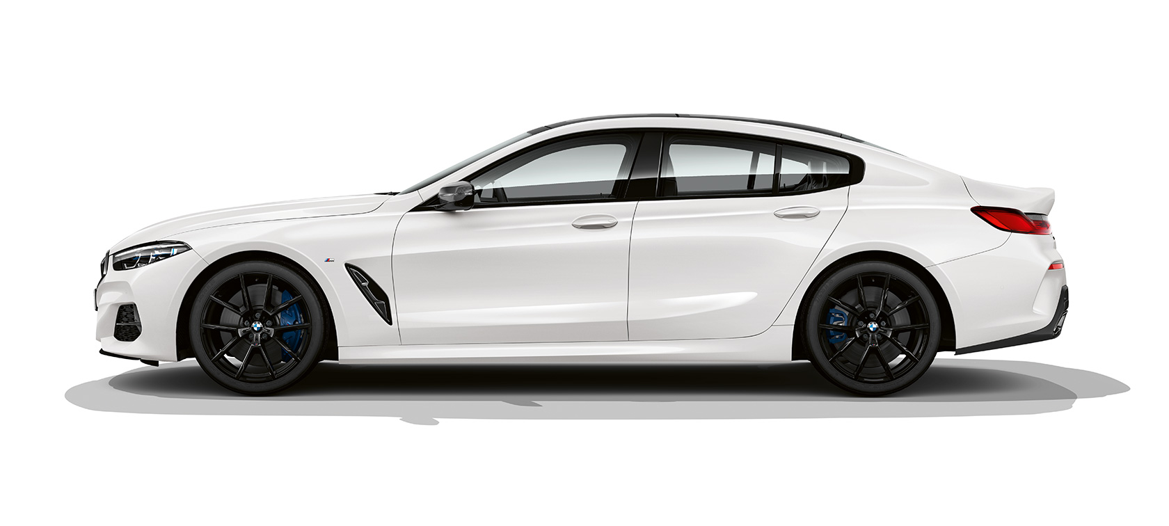 Vista lateral del BMW M850i xDrive Gran Coupé Vista lateral del BMW M850i xDrive Gran Coupé G16 2019 BMW Individual Mineral White