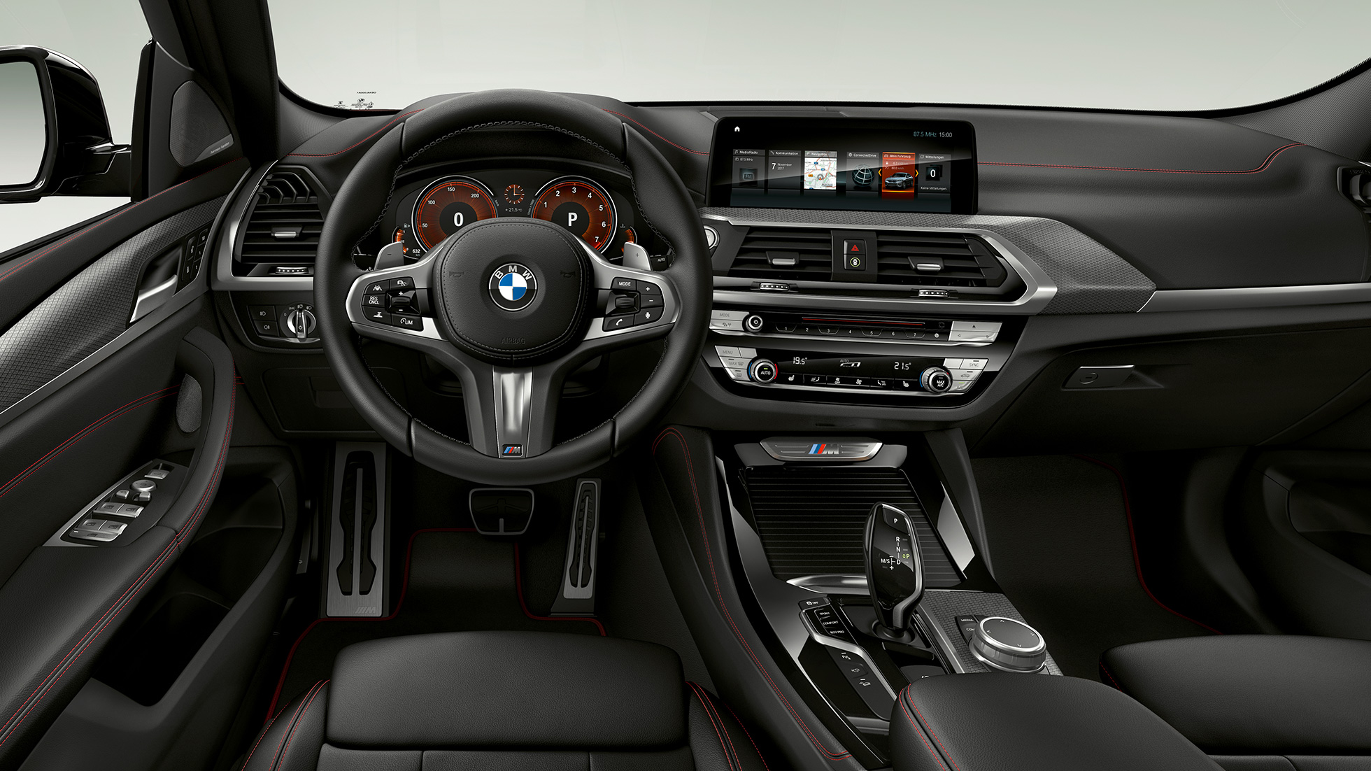 BMW X4 M40i and BMW X4 M40d, cockpit. BMW X4 M40i and BMW X4 M40d, interior, cockpit with M leather steering wheel and M Sport seats.