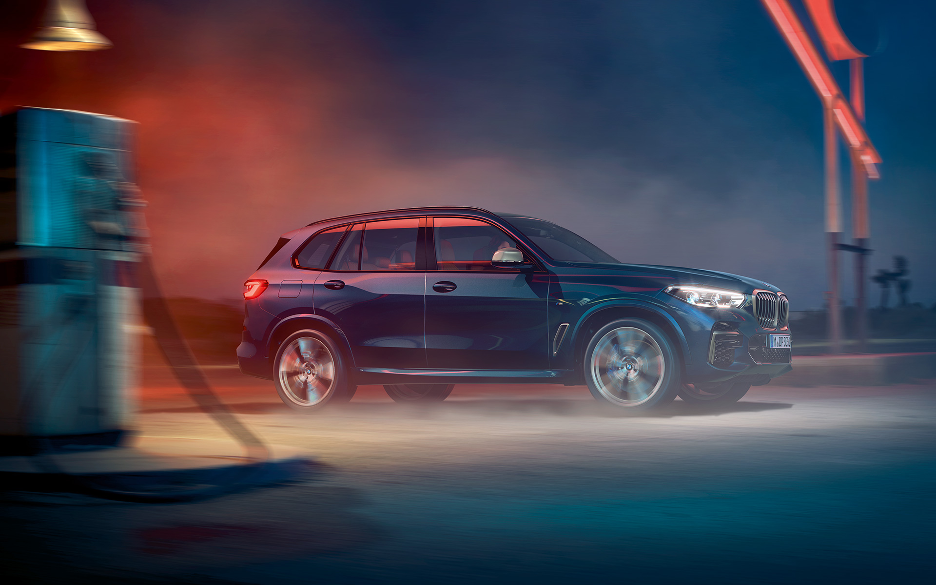 BMW X5 M50i y M50d G05 2018 SUV con llantas de aleación ligera M en Carbon Black metalizado, vista lateral
